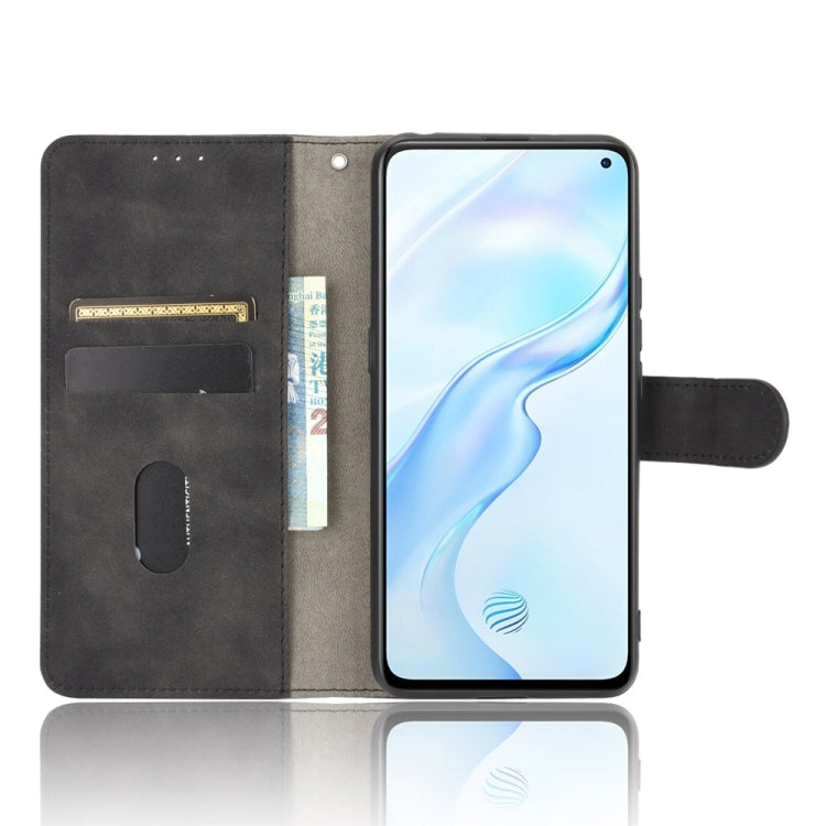 For Vivo X30 Pro Solid Color Skin Feel Magnetic Buckle Horizontal Flip Calf Texture PU Leather Case with Holder & Card Slots & Wallet