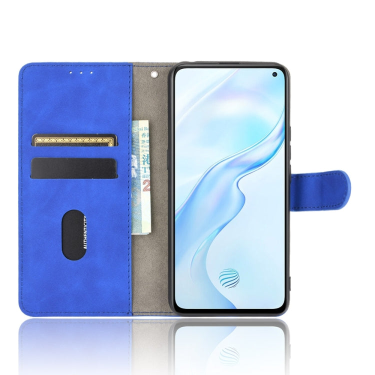 For Vivo X30 Pro Solid Color Skin Feel Magnetic Buckle Horizontal Flip Calf Texture PU Leather Case with Holder & Card Slots & Wallet
