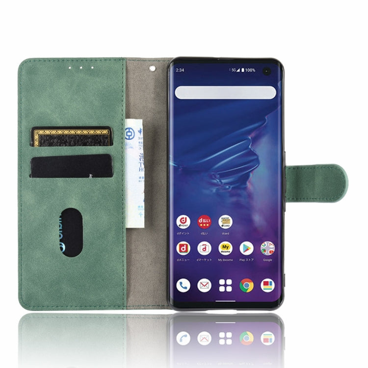 For Fujitsu Arrows 5G (F-51A) Solid Color Skin Feel Magnetic Buckle Horizontal Flip Calf Texture PU Leather Case with Holder & Card Slots & Wallet