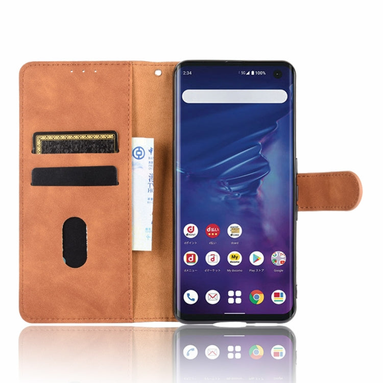 For Fujitsu Arrows 5G (F-51A) Solid Color Skin Feel Magnetic Buckle Horizontal Flip Calf Texture PU Leather Case with Holder & Card Slots & Wallet