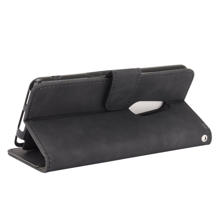 For Fujitsu Arrows Be4 (F-41A) Solid Color Skin Feel Magnetic Buckle Horizontal Flip Calf Texture PU Leather Case with Holder & Card Slots & Wallet