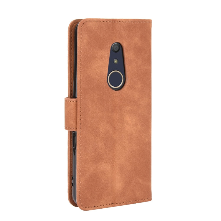 For Fujitsu Arrows Be4 (F-41A) Solid Color Skin Feel Magnetic Buckle Horizontal Flip Calf Texture PU Leather Case with Holder & Card Slots & Wallet