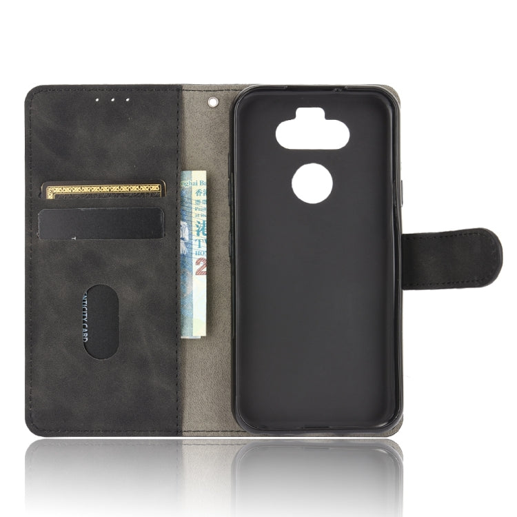 For LG K31 / Aristo 5 Solid Color Skin Feel Magnetic Buckle Horizontal Flip Calf Texture PU Leather Case with Holder & Card Slots & Wallet