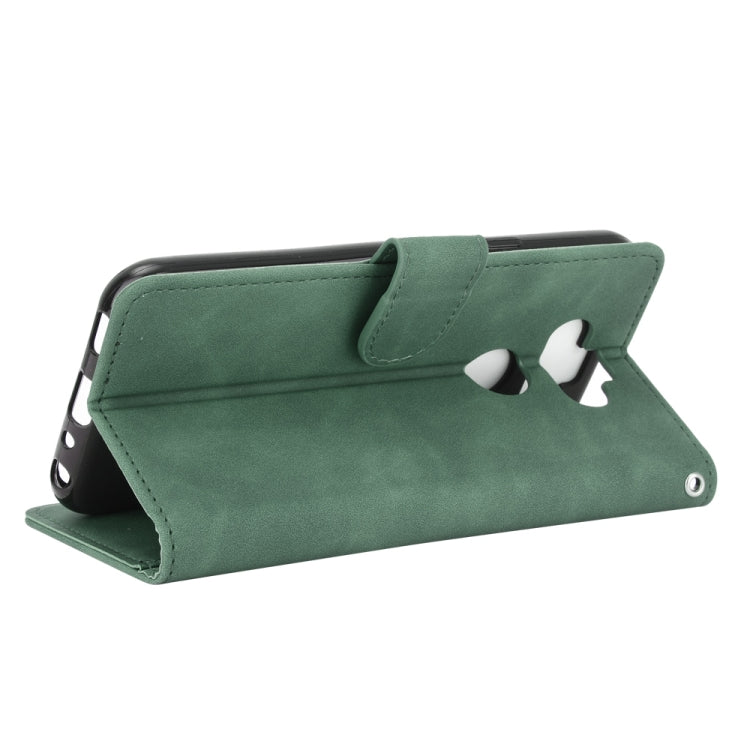 For LG K31 / Aristo 5 Solid Color Skin Feel Magnetic Buckle Horizontal Flip Calf Texture PU Leather Case with Holder & Card Slots & Wallet