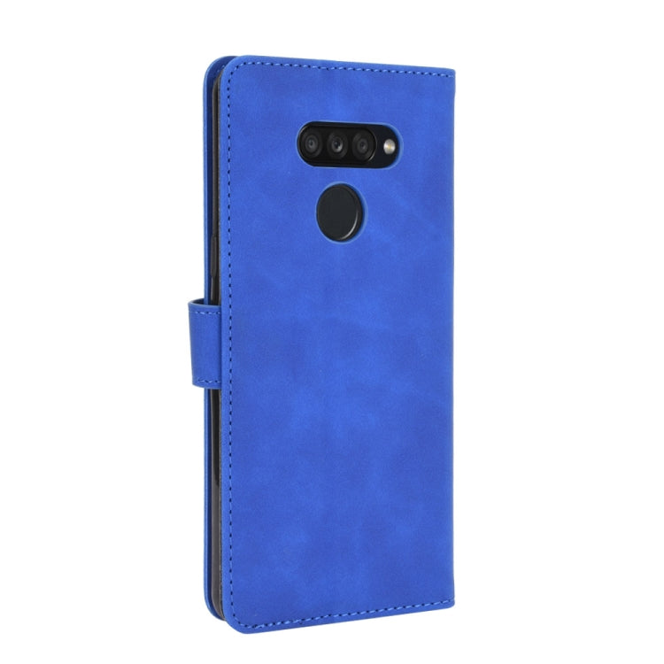 For LG K50S Solid Color Skin Feel Magnetic Buckle Horizontal Flip Calf Texture PU Leather Case with Holder & Card Slots & Wallet