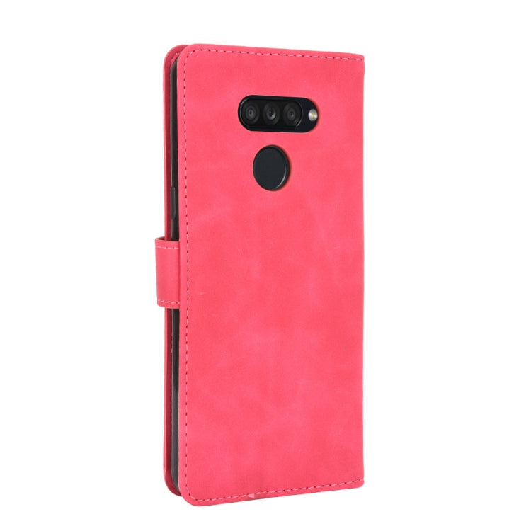 For LG K50S Solid Color Skin Feel Magnetic Buckle Horizontal Flip Calf Texture PU Leather Case with Holder & Card Slots & Wallet