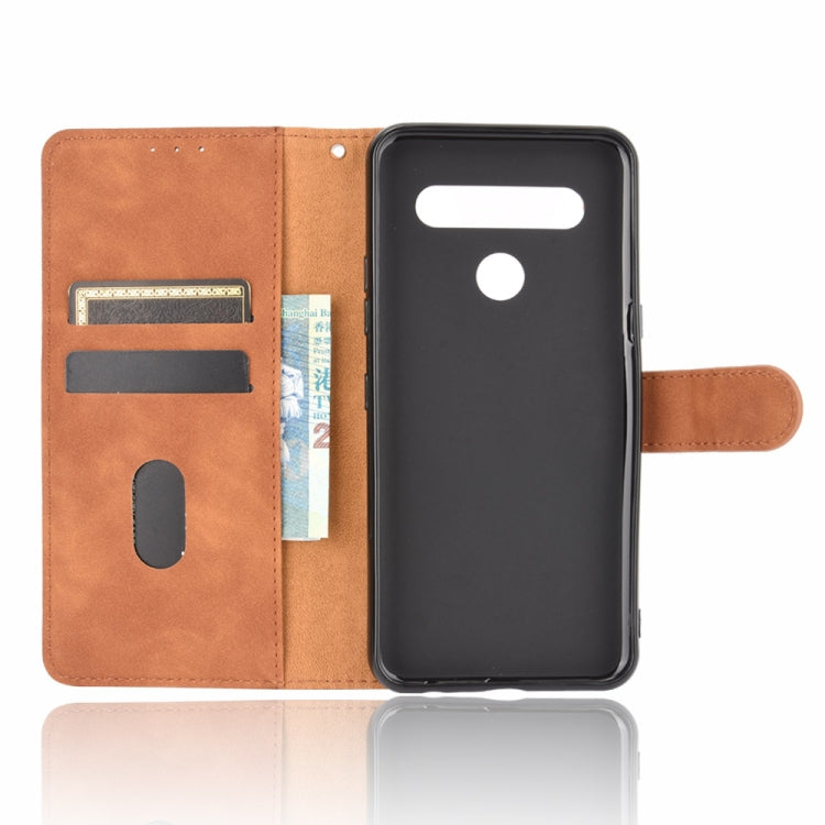 For LG K61 / Q61 Solid Color Skin Feel Magnetic Buckle Horizontal Flip Calf Texture PU Leather Case with Holder & Card Slots & Wallet