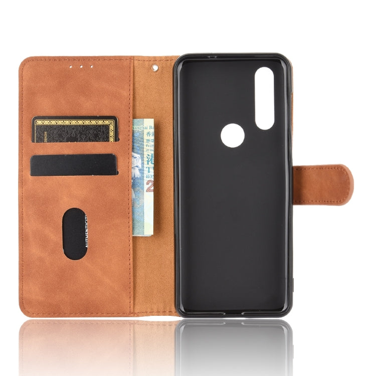 For Motorola Moto P40 Power / One Action Solid Color Skin Feel Magnetic Buckle Horizontal Flip Calf Texture PU Leather Case with Holder & Card Slots & Wallet