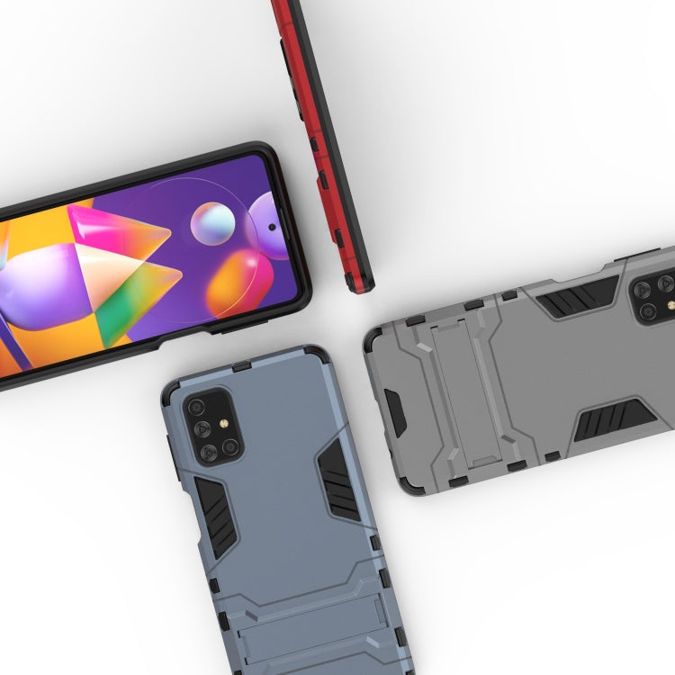 For Samsung Galaxy M31s PC + TPU Shockproof Protective Case with Invisible Holder