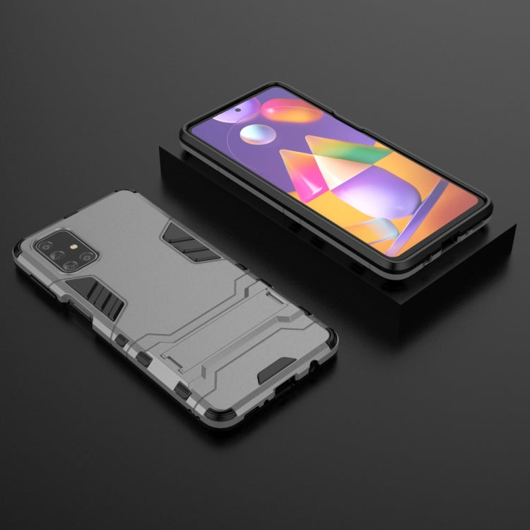 For Samsung Galaxy M31s PC + TPU Shockproof Protective Case with Invisible Holder