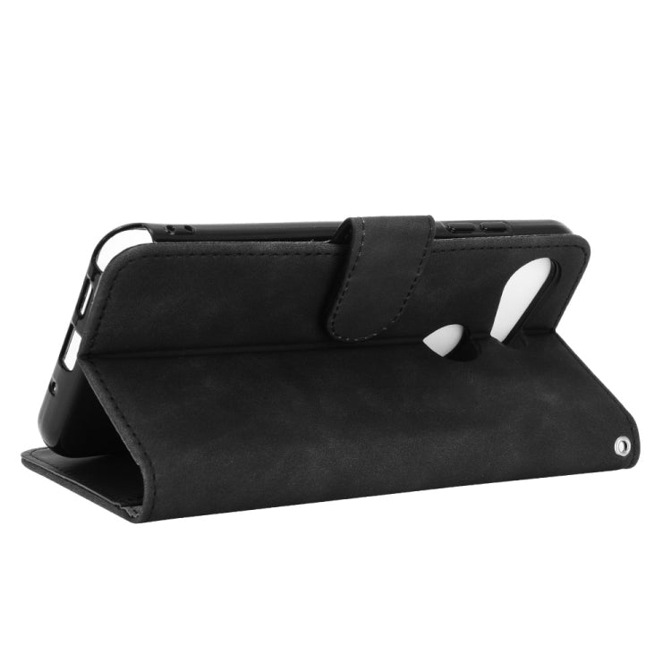 For Kyocera Gratina KYV48 Solid Color Skin Feel Magnetic Buckle Horizontal Flip Calf Texture PU Leather Case with Holder & Card Slots & Wallet