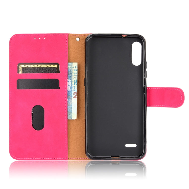 For LG K22 Solid Color Skin Feel Magnetic Buckle Horizontal Flip Calf Texture PU Leather Case with Holder & Card Slots & Wallet