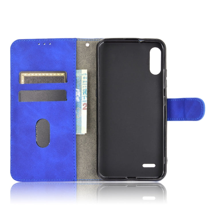 For LG K22 Solid Color Skin Feel Magnetic Buckle Horizontal Flip Calf Texture PU Leather Case with Holder & Card Slots & Wallet