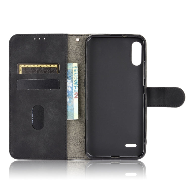 For LG K22 Solid Color Skin Feel Magnetic Buckle Horizontal Flip Calf Texture PU Leather Case with Holder & Card Slots & Wallet