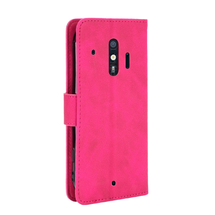 For Fujitsu F-42A / F-01L Solid Color Skin Feel Magnetic Buckle Horizontal Flip Calf Texture PU Leather Case with Holder & Card Slots & Wallet