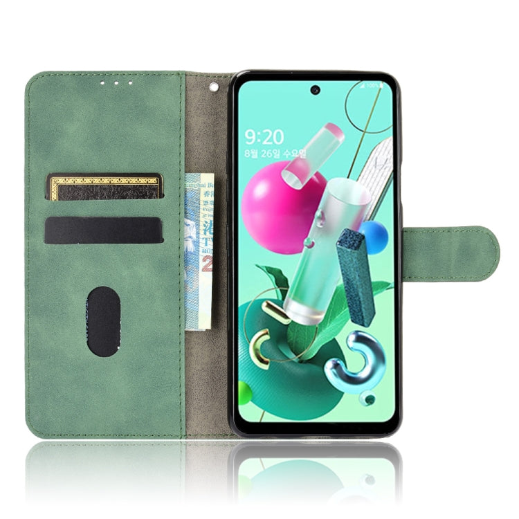 For LG Q92 5G Solid Color Skin Feel Magnetic Buckle Horizontal Flip Calf Texture PU Leather Case with Holder & Card Slots & Wallet