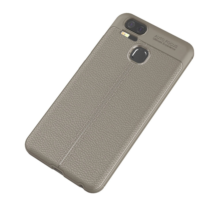 For Asus Zenfone 3 Zoom (ZE553KL) Litchi Texture Soft TPU Anti-skip Protective Cover Back Case