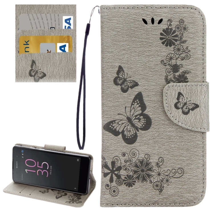 For Sony Xperia E5 Butterflies Embossing Horizontal Flip Leather Case with Holder & Card Slots & Wallet & Lanyard