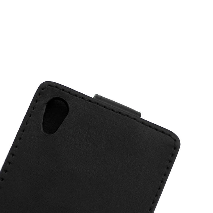 Vertical Flip Magnetic Buckle PU Leather Case for Sony Xperia Z5 / E6603 / E6653 / E6633 / E6683(Black)