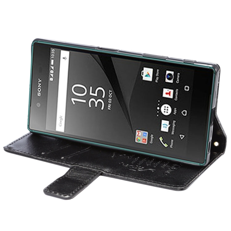 Lambskin Texture Words and Flowers Printing Horizontal Flip Solid Color Leather Case with Holder and Card Slots for Sony Xperia Z5 Premium / Plus