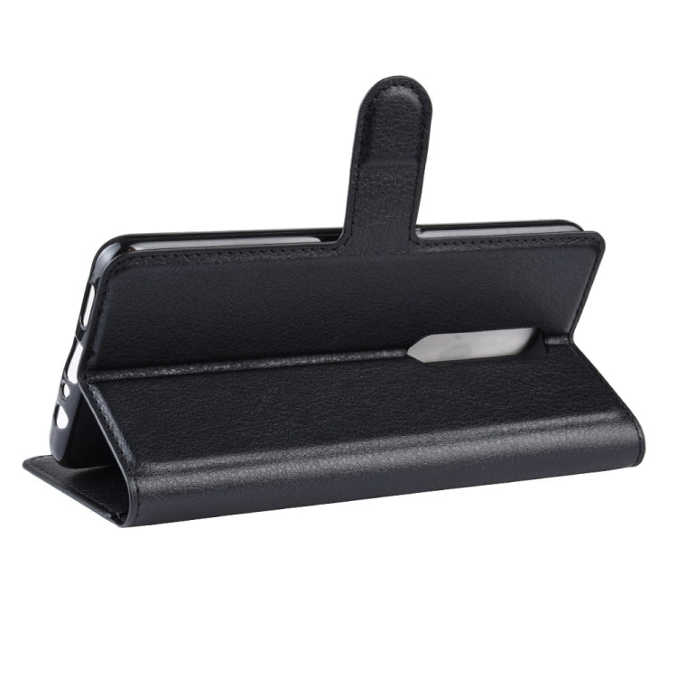 Litchi Texture Horizontal Flip Leather Case for OPPO F11 Pro, with Magnetic Buckle & Holder & Card Slots & Wallet