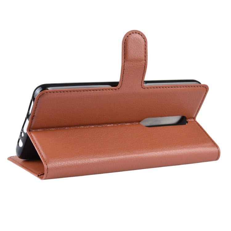 Litchi Texture Horizontal Flip Leather Case for OPPO F11 Pro, with Magnetic Buckle & Holder & Card Slots & Wallet