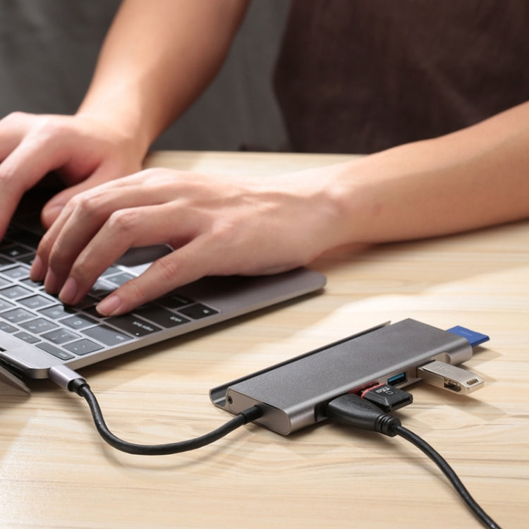 7-in-1 USB 3.1 hub type-C to USB 3.0 * 3 + HDMI 4K + SD / TF + PD with mobile phone bracket for MacBook PC millet tablet