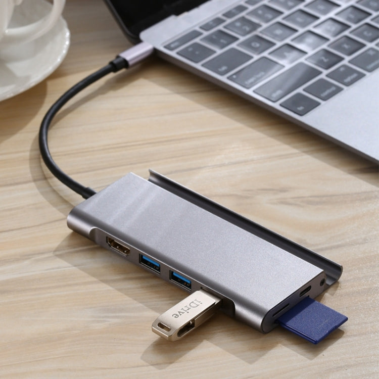 7-in-1 USB 3.1 hub type-C to USB 3.0 * 3 + HDMI 4K + SD / TF + PD with mobile phone bracket for MacBook PC millet tablet