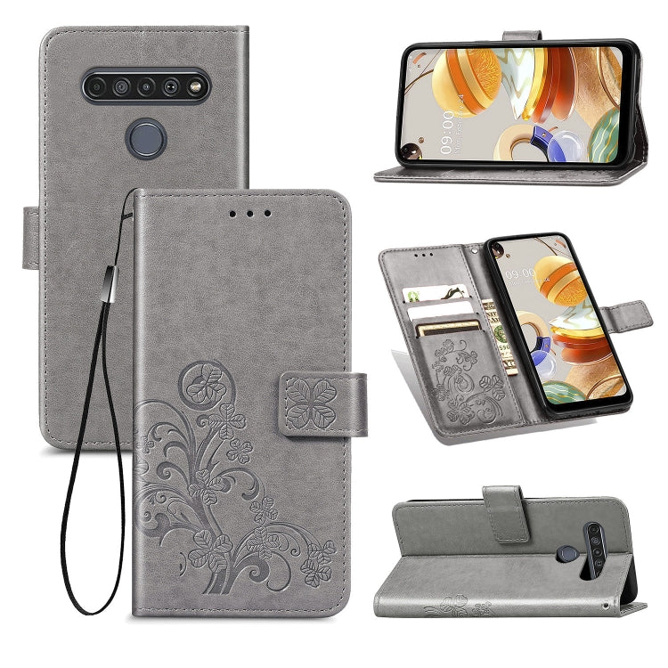 For LG K61 Four-leaf Clasp Embossed Buckle Mobile Phone Protection Leather Case with Lanyard & Card Slot & Wallet & Bracket Function