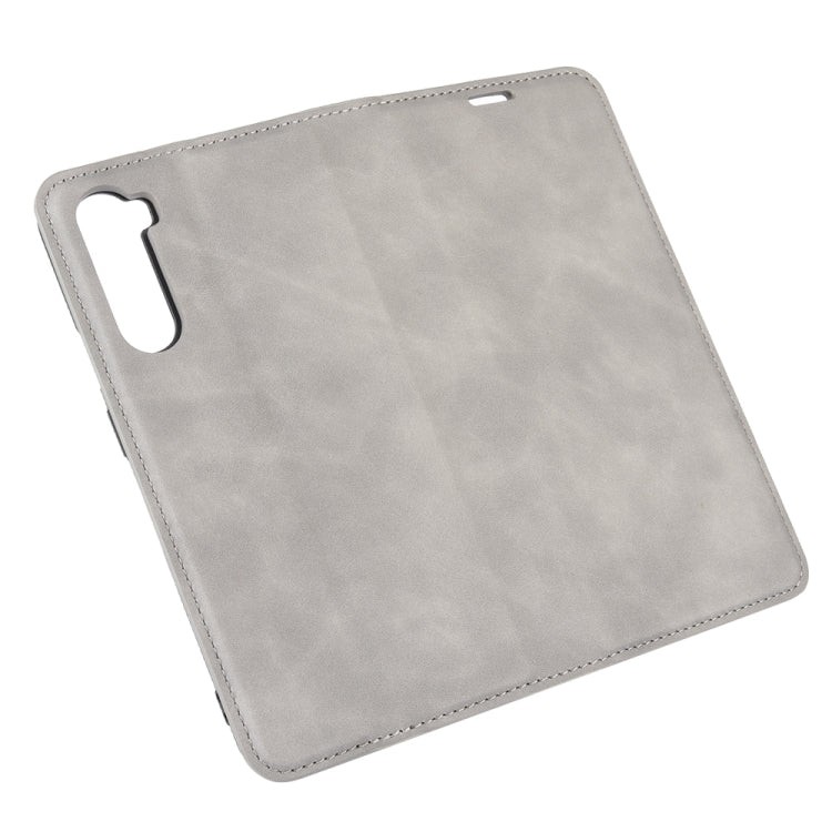 For OnePlus Nord Retro-skin Business Magnetic Suction Leather Case with Holder & Card Slots & Wallet