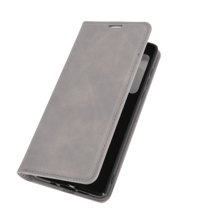 For Motorola Moto Edge Retro-skin Business Magnetic Suction Leather Case with Holder & Card Slots & Wallet