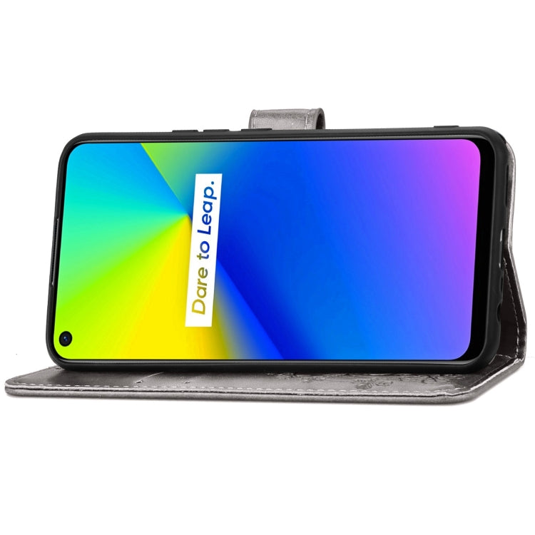 Four-leaf Clasp Embossed Buckle Mobile Phone Protection Leather Case with Lanyard & Card Slot & Wallet & Bracket Function For OPPO Realme 7i / C17