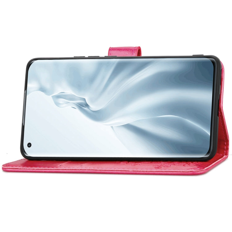 For Xiaomi Mi 11 Four-leaf Clasp Embossed Buckle Mobile Phone Protection Leather Case with Lanyard & Card Slot & Wallet & Bracket Function