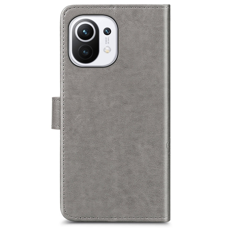 For Xiaomi Mi 11 Four-leaf Clasp Embossed Buckle Mobile Phone Protection Leather Case with Lanyard & Card Slot & Wallet & Bracket Function