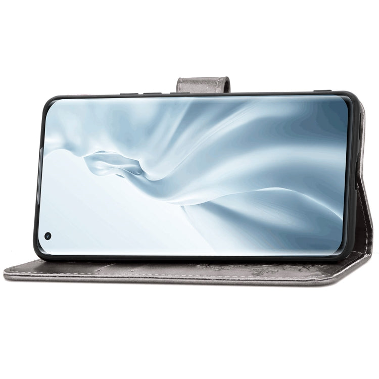 For Xiaomi Mi 11 Four-leaf Clasp Embossed Buckle Mobile Phone Protection Leather Case with Lanyard & Card Slot & Wallet & Bracket Function