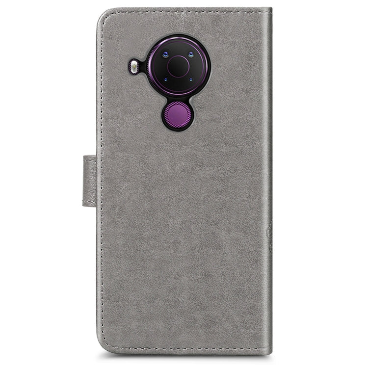 For Nokia 5.4 Four-leaf Clasp Embossed Buckle Mobile Phone Protection Leather Case with Lanyard & Card Slot & Wallet & Bracket Function