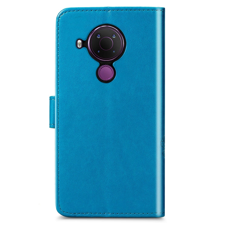 For Nokia 5.4 Four-leaf Clasp Embossed Buckle Mobile Phone Protection Leather Case with Lanyard & Card Slot & Wallet & Bracket Function