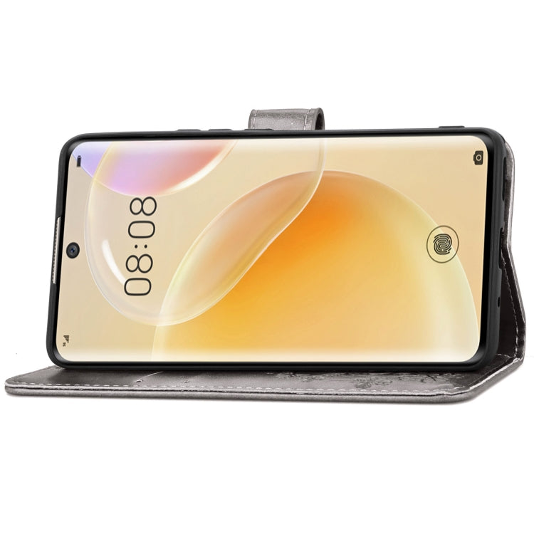 For Huawei Nova 8 Four-leaf Clasp Embossed Buckle Mobile Phone Protection Leather Case with Lanyard & Card Slot & Wallet & Bracket Function