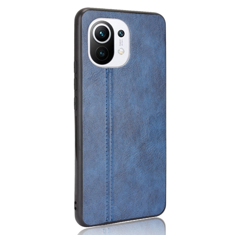 For Xiaomi Mi 11 Shockproof Sewing Cow Pattern Skin PC + PU + TPU Case