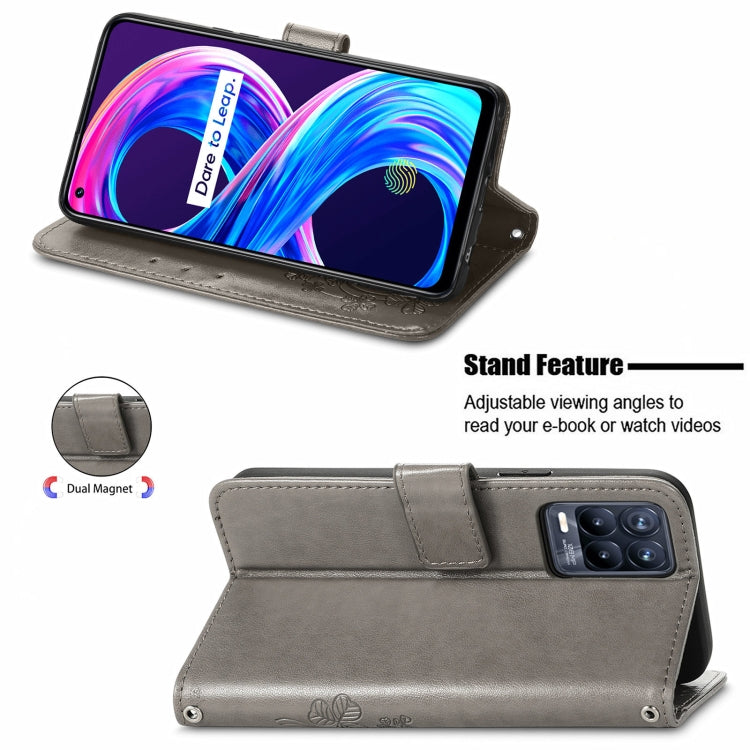 For OPPO Realme 8 5G / Realme V13 5G Four-leaf Clasp Embossed Buckle Mobile Phone Protection Leather Case with Lanyard & Card Slot & Wallet & Bracket Function