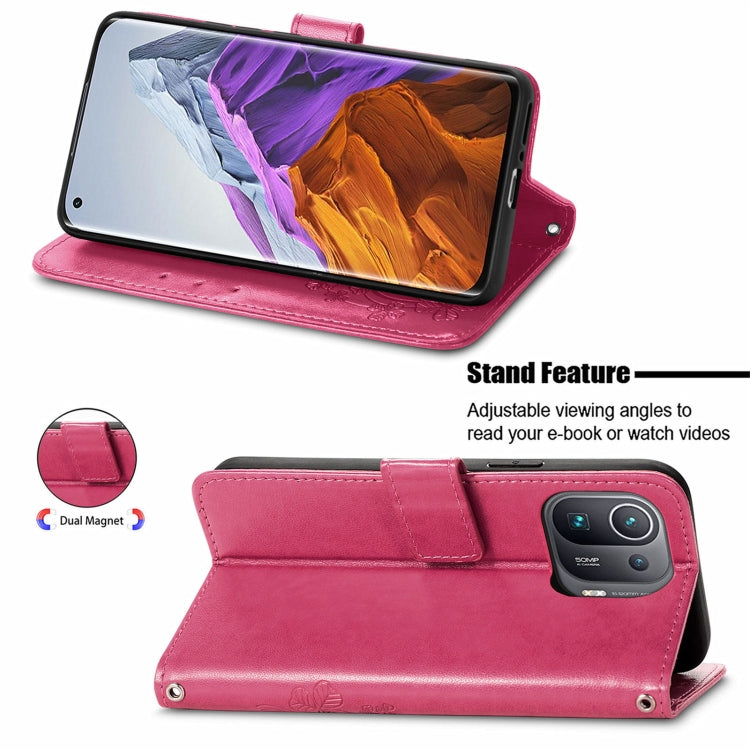 For Xiaomi Mi 11 Pro Four-leaf Clasp Embossed Buckle Mobile Phone Protection Leather Case with Lanyard & Card Slot & Wallet & Bracket Function