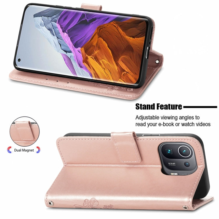 For Xiaomi Mi 11 Pro Four-leaf Clasp Embossed Buckle Mobile Phone Protection Leather Case with Lanyard & Card Slot & Wallet & Bracket Function