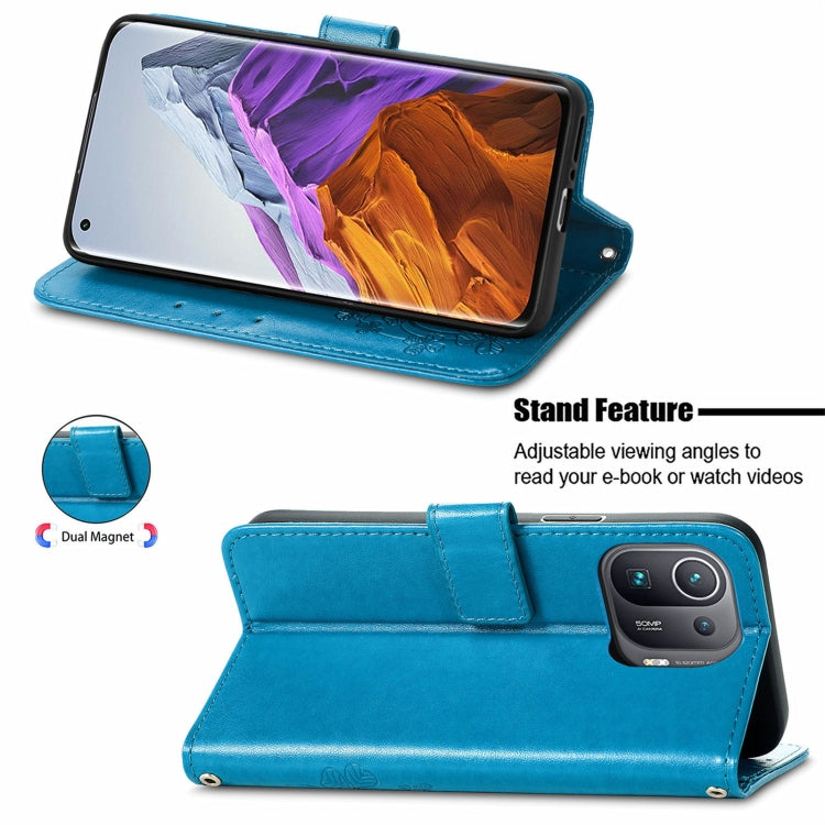 For Xiaomi Mi 11 Pro Four-leaf Clasp Embossed Buckle Mobile Phone Protection Leather Case with Lanyard & Card Slot & Wallet & Bracket Function