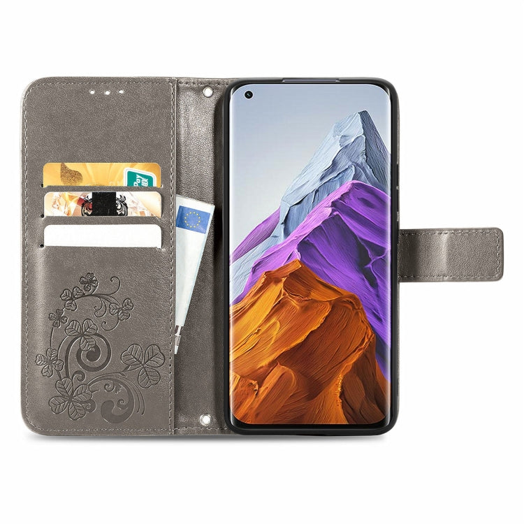 For Xiaomi Mi 11 Pro Four-leaf Clasp Embossed Buckle Mobile Phone Protection Leather Case with Lanyard & Card Slot & Wallet & Bracket Function