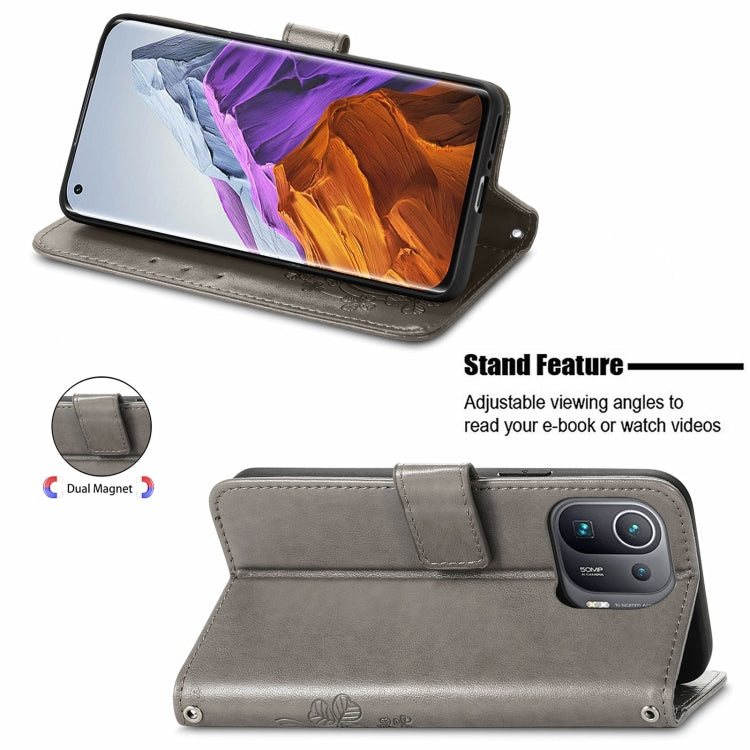 For Xiaomi Mi 11 Pro Four-leaf Clasp Embossed Buckle Mobile Phone Protection Leather Case with Lanyard & Card Slot & Wallet & Bracket Function