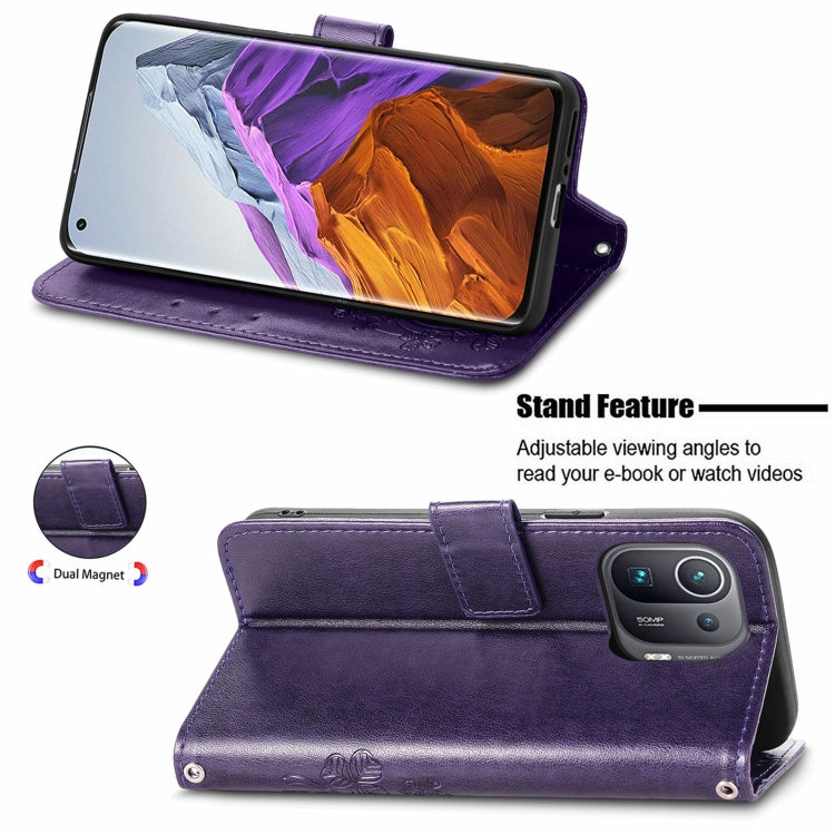 For Xiaomi Mi 11 Pro Four-leaf Clasp Embossed Buckle Mobile Phone Protection Leather Case with Lanyard & Card Slot & Wallet & Bracket Function