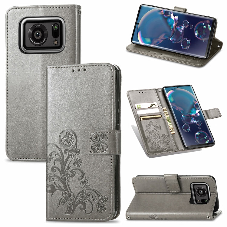 For Sharp R6 Four-leaf Clasp Embossed Buckle Mobile Phone Protection Leather Case with Lanyard & Card Slot & Wallet & Bracket Function