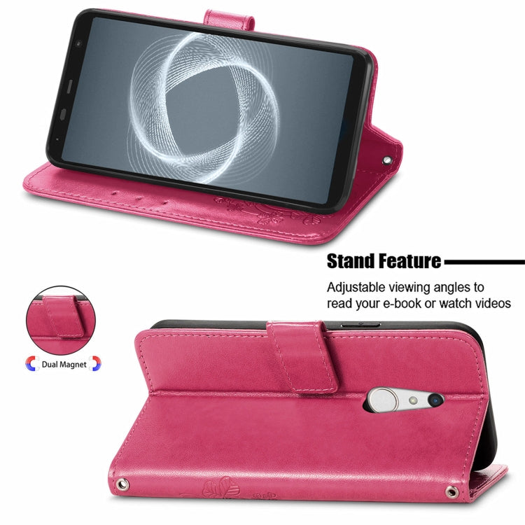 For FUJITSU F-41B Four-leaf Clasp Embossed Buckle Mobile Phone Protection Leather Case with Lanyard & Card Slot & Wallet & Bracket Function