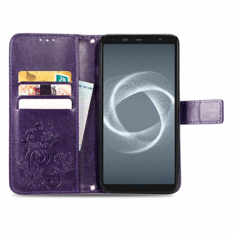 For FUJITSU F-41B Four-leaf Clasp Embossed Buckle Mobile Phone Protection Leather Case with Lanyard & Card Slot & Wallet & Bracket Function