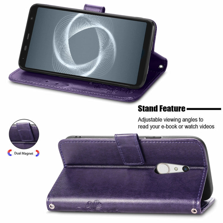 For FUJITSU F-41B Four-leaf Clasp Embossed Buckle Mobile Phone Protection Leather Case with Lanyard & Card Slot & Wallet & Bracket Function